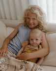 Children’s Merino Clothing Singlet and Bodysuit worn by siblings during a family photoshoot
