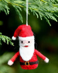 Felt Santa Claus ornament hanging on a Christmas tree