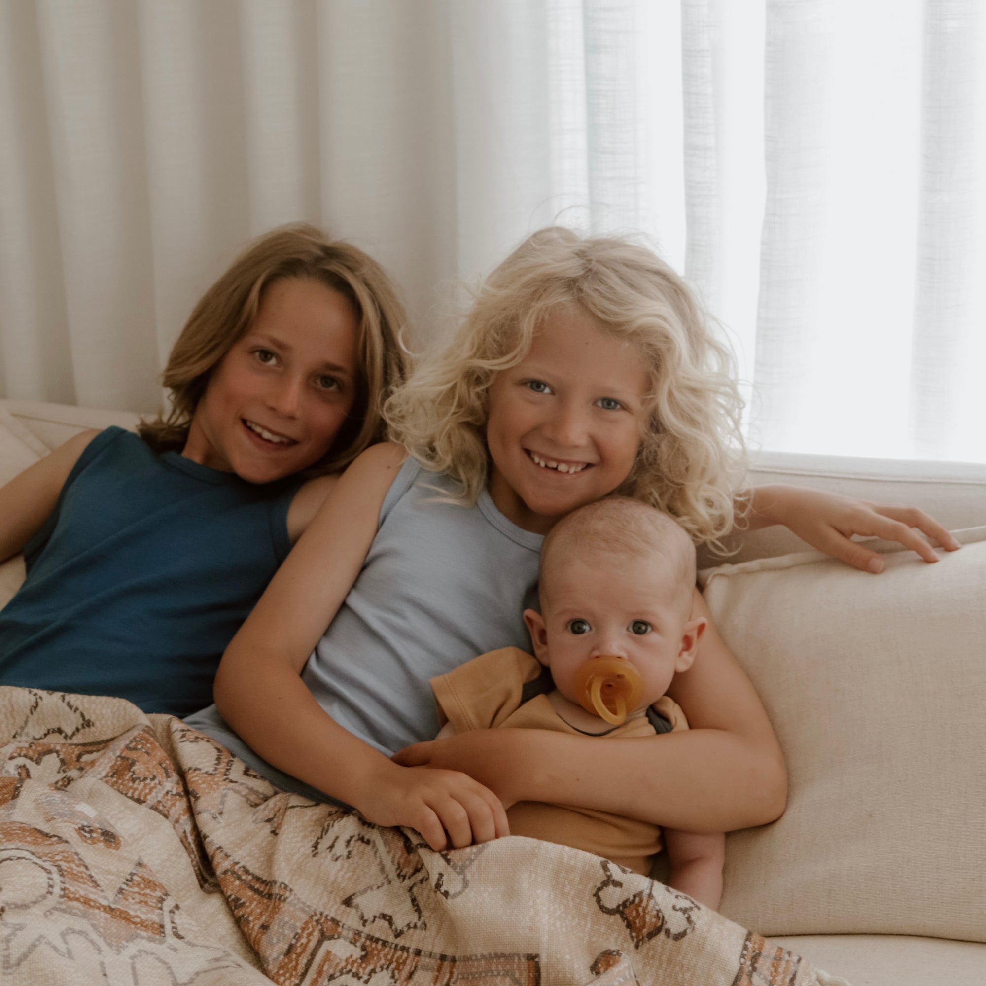 Newborn baby and older brother family photography wearing Babu Basics Singlet and Bodysuit